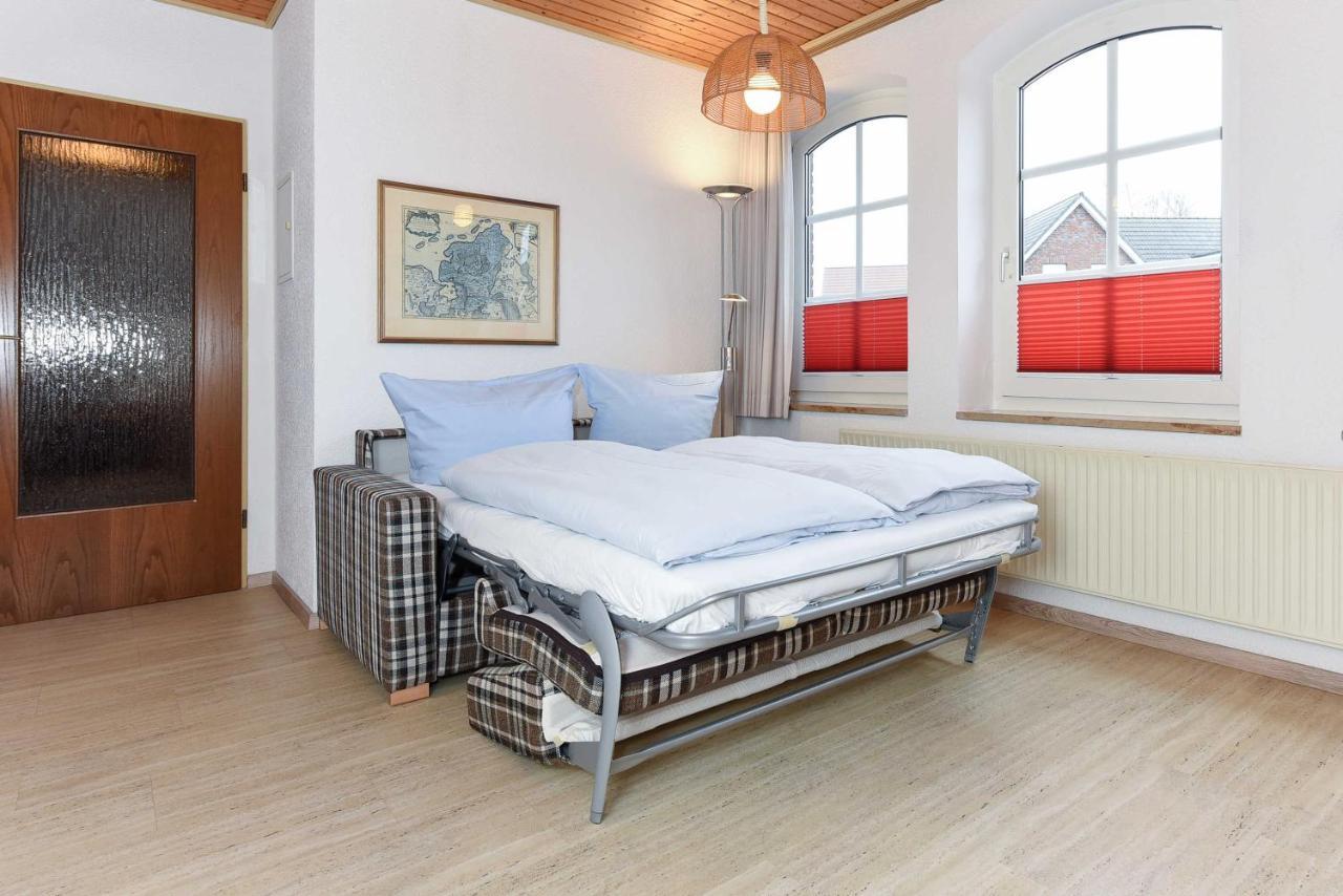 Ferienwohnungen Im Gezeitenhaus Bensersiel Exterior foto